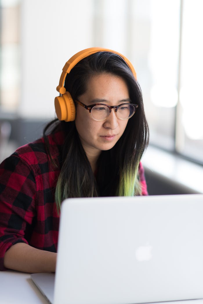 Woman Infront of Macbook